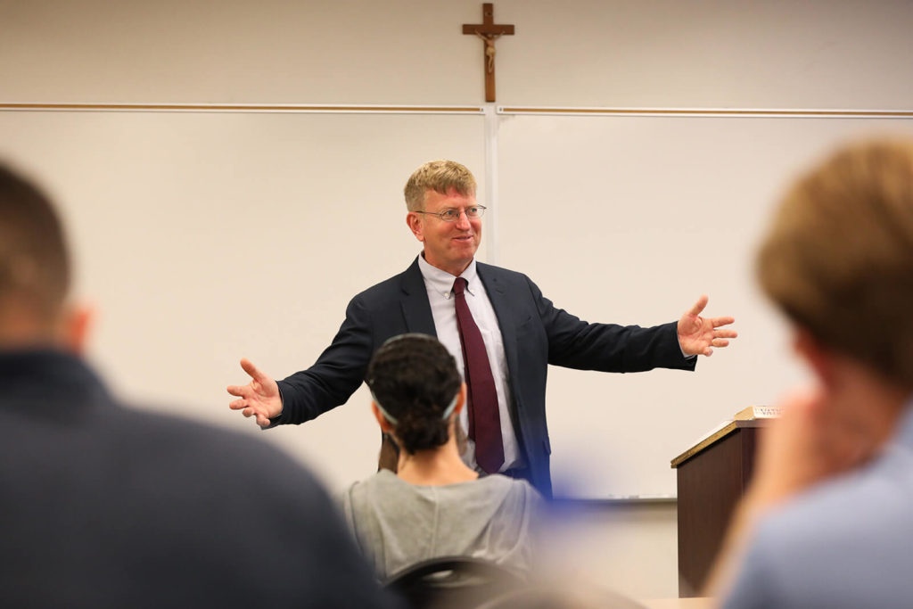 Dr. Nicholas Healy presenting to theology class