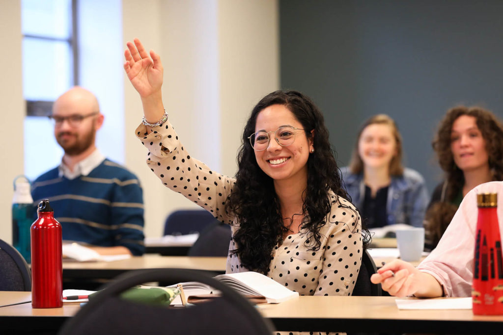 Smiling student in class