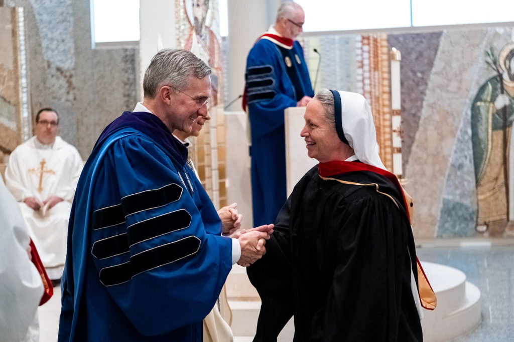 Sister of Life receiving MTS diploma from Patrick Kelly