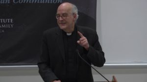 Rev. Jacques Servais, S.J. speaking
